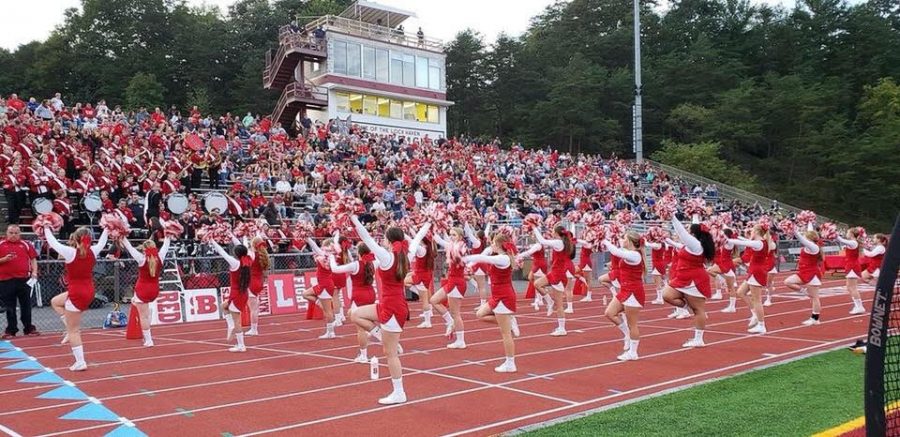The cheerleaders rally for the football team against Philipsburg-Osceola on September 7.