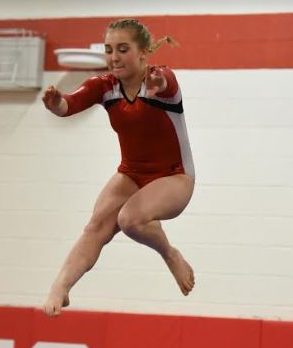 Junior Aleah Krout on the beam.