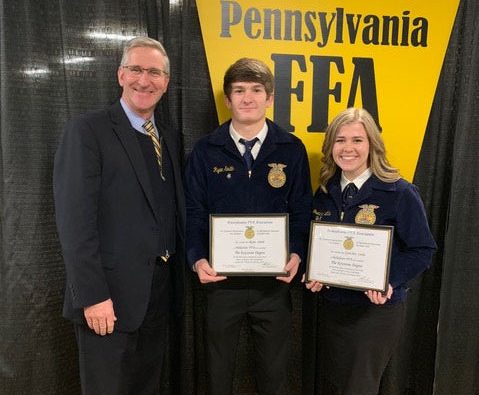 Seniors Ryan Smith and Gretchen Little at the PA Farm Show.