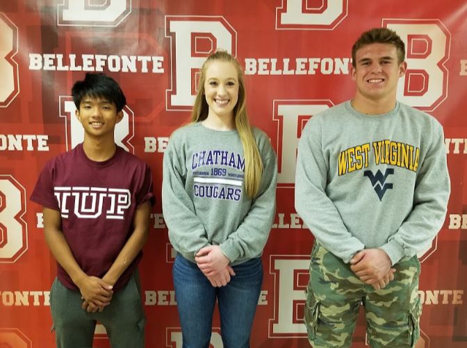 Seniors Moryelle Fernandez, Shaelah Pepperman, and Kyle Myers sign letters of intent at the Spring Signing. 