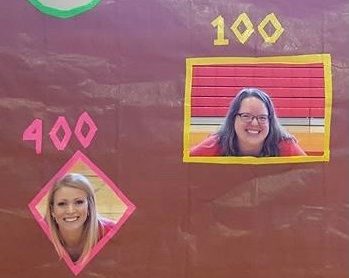 Mrs. Baughman and Mrs. Rodgers participate in a pep rally a couple of years ago. 