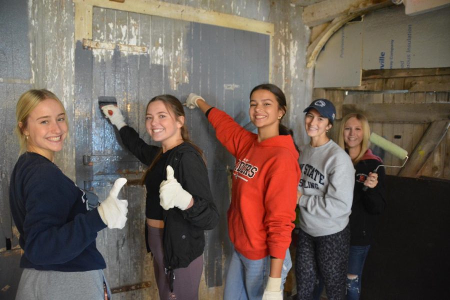 (Left to right) Seniors Ava Bressler, Olivia Astare, Emma Rossman, Madison Melius, and Kiera Narehood participate in the annual Day of Caring.