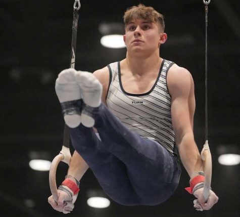Landon Simpson successfully holds
t-pose securing sixth place in the
nation on rings.