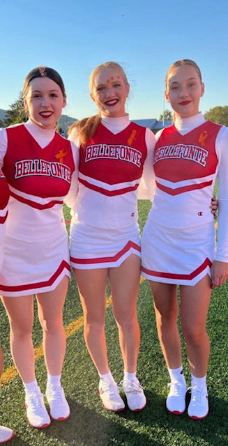 Left- Nici Schneider
Middle- Makenna Williams
Right- Lorena Orea
Foreign exchange students cheer at their first football game.