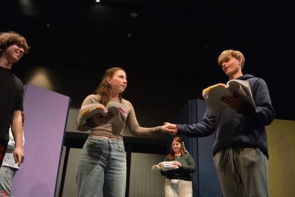Erin Ashe and Sam Henry practice their lead roles in this Springs production of Between the Lines.