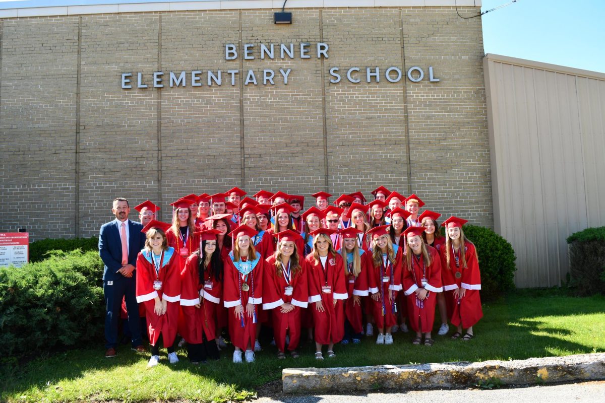 Dr. Vancas posed with members of the Class of 2024 outside of Benner. 