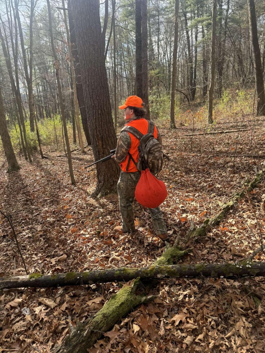 Senior Austin Irvin finds peace in the woods after a long week of school. 