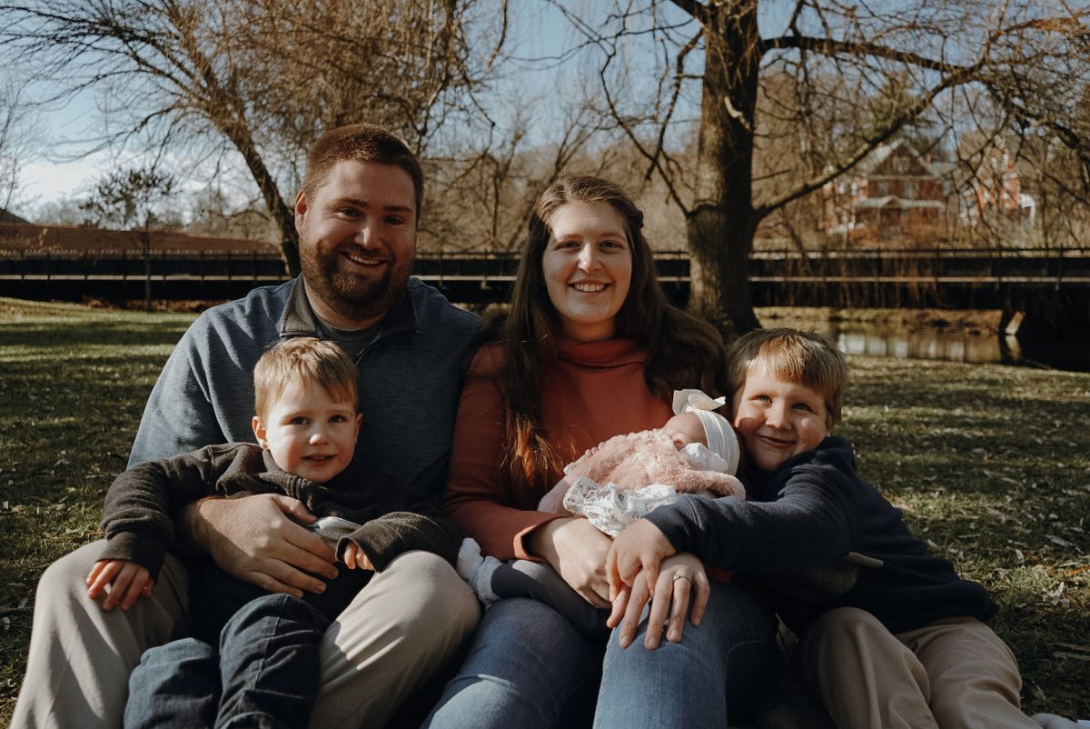 Math teacher Mrs. Ashley Fisher with her husband and three children.