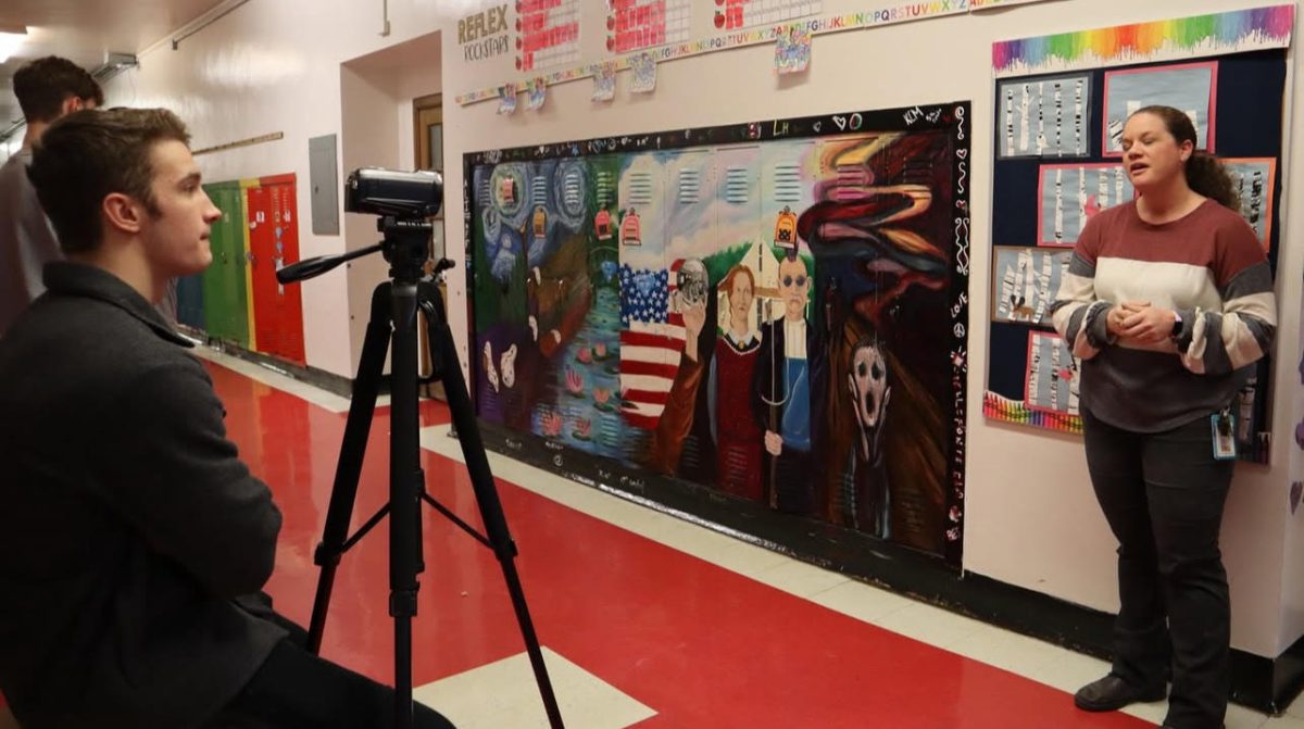 Senior Ryder Hamilton works on the documentary. 